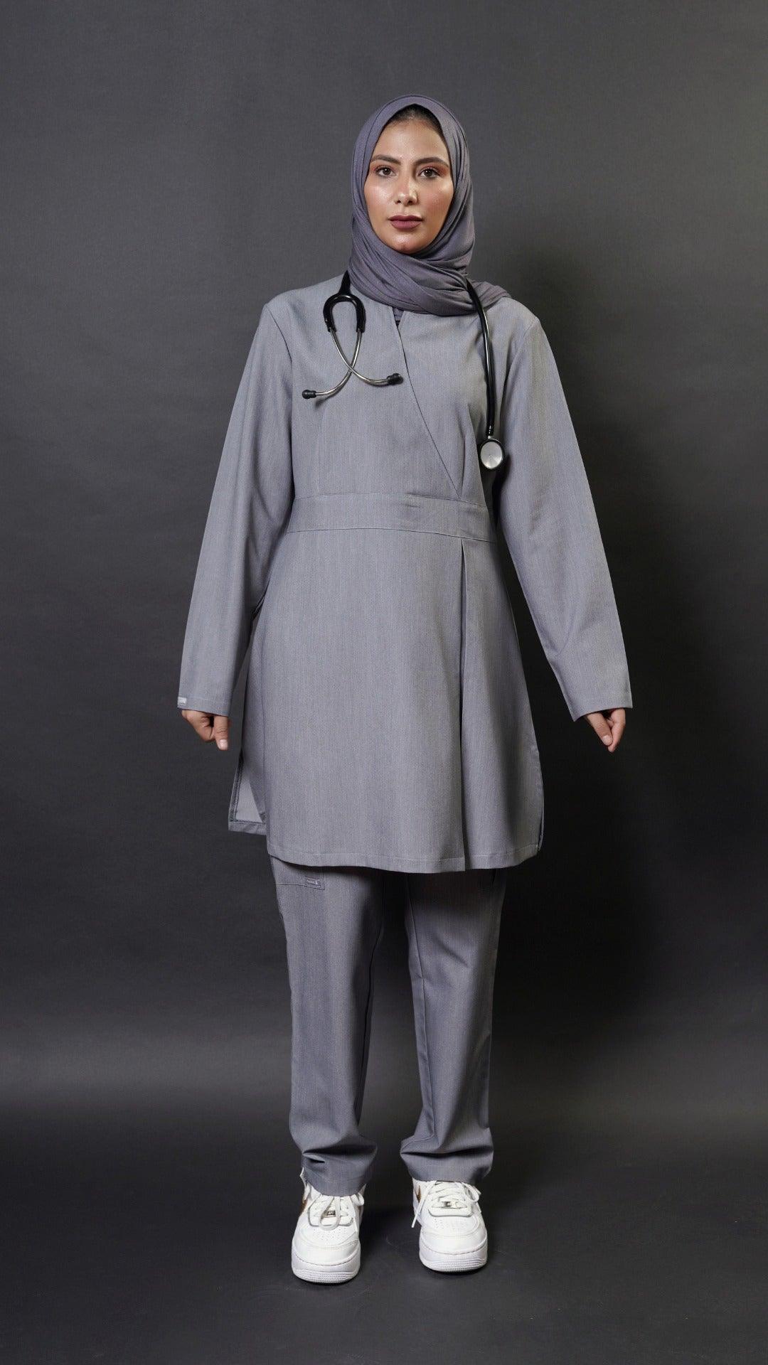   Extra long scrub top with long sleeves in grey perfect for women in healthcare! This top has a 36 inch length and flare top design for a modest look. It's also hijabi friendly, so you can feel comfortable and cover the lower bottom.