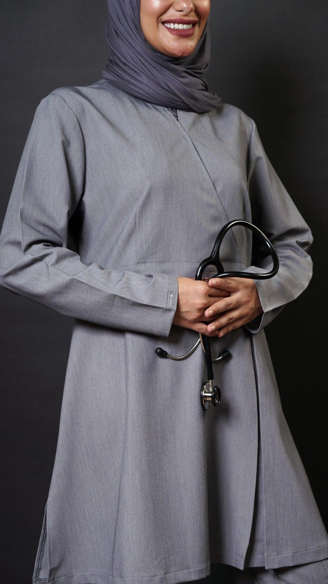   Extra long scrub top with long sleeves in grey perfect for women in healthcare! This top has a 36 inch length and flare top design for a modest look. It's also hijabi friendly, so you can feel comfortable and cover the lower bottom.