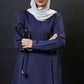  Extra long scrub top with long sleeves in navy blue perfect for women in healthcare! This top has a 36 inch length and flare top design for a modest look. It's also hijabi friendly, so you can feel comfortable and cover the lower bottom.